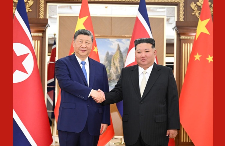 习近平同金正恩举行会谈