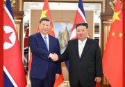 习近平同金正恩举行会谈